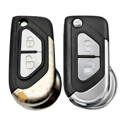 A citroen ds3 2 button key fob repair service showing one worn and one new black plastic casing.