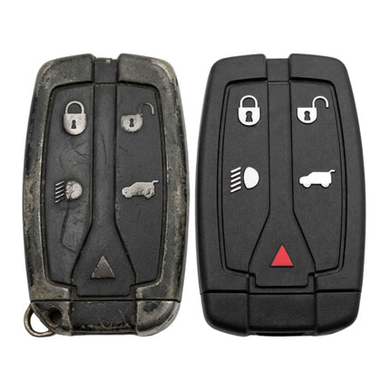 Two car key fobs shown side by side on a plain white background, one weathered black and one glossy black with silver button icons and a red hazard triangle.