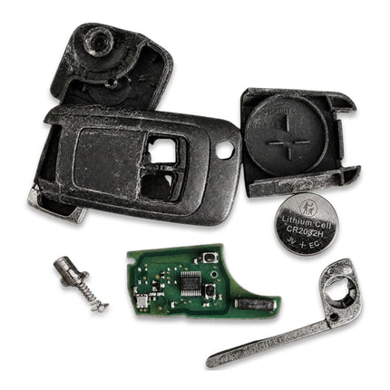 Internal components of Vauxhall B12E 2 button flip remote key before repair