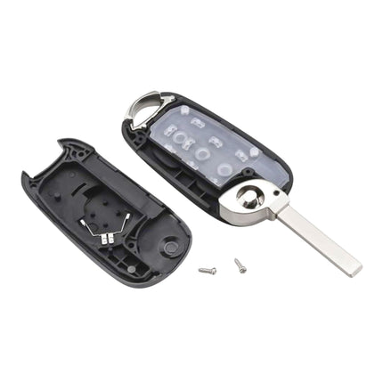 Remote key fob shell opened showing internal layout and rubber button pad