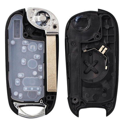 Remote key fob shell opened showing internal layout and rubber button pad